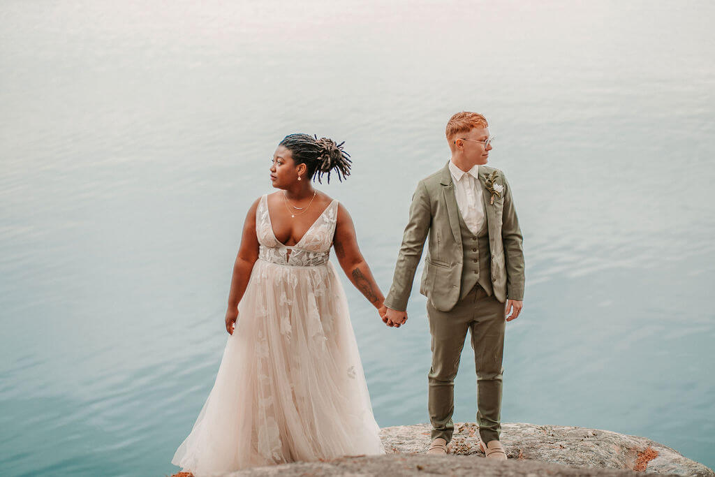 Couple holding hands during their elopement in a national park.