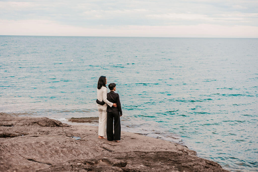 Couple looking out to the lake during their elopement.